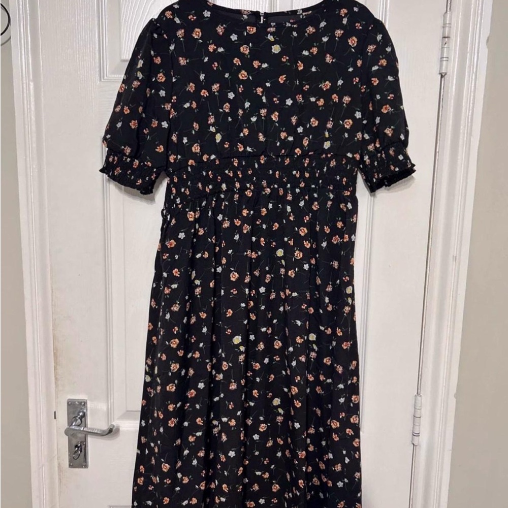 Elegant Black Dress with Floral Design